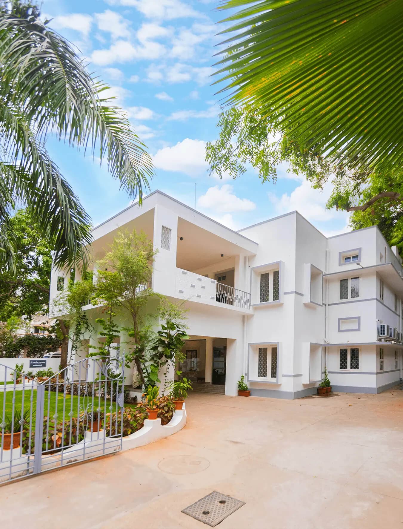 Modern heritage event venue in Chennai with spacious rooms, terrace, and lush greenery - Perfect for weddings and corporate events