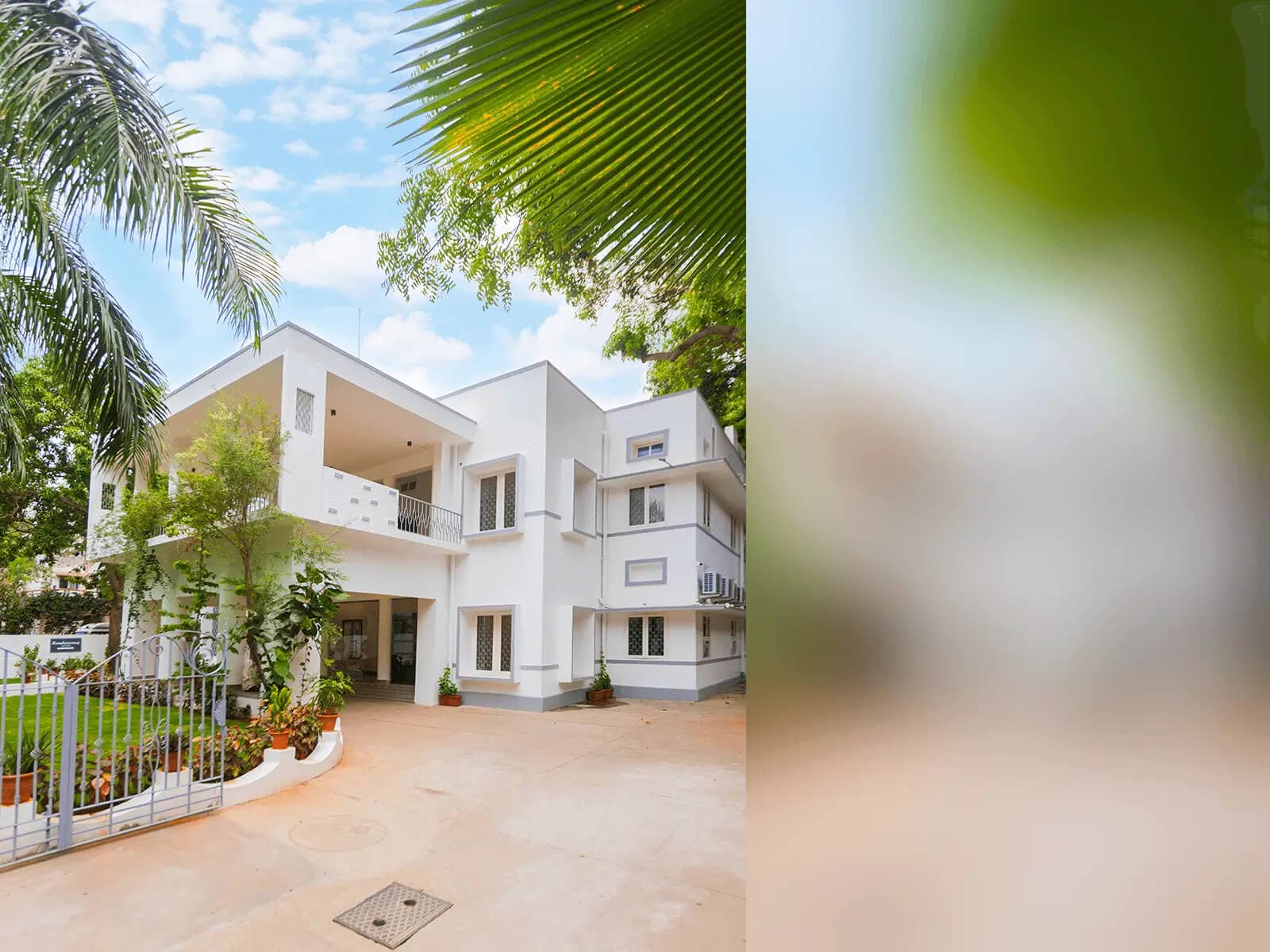 Modern heritage multipurpose event venue in Chennai with spacious rooms, terrace, and lush greenery - Perfect for weddings and corporate events